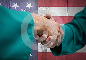 Handshake for independence day against american flag background