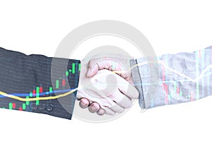 Handshake Investing and stock market concept gain and profits with faded candlestick charts.