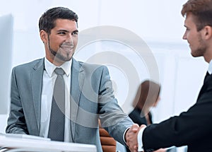 Handshake Manager and the client in the office.