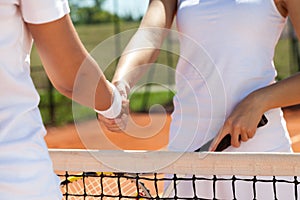 Handshake at a tennis match