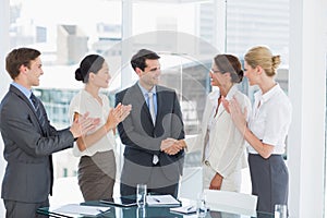 Handshake to seal a deal after a job recruitment meeting