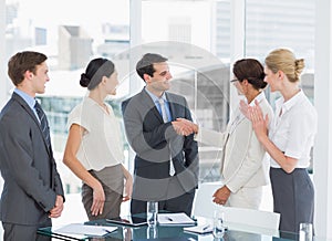 Handshake to seal a deal after a job recruitment meeting