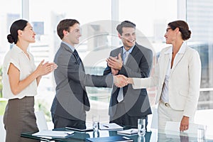 Handshake to seal a deal after a job recruitment meeting