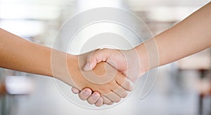 Handshake together in business contracting. Honesty at work. Work as a team and trust each other. Employee contract. Being