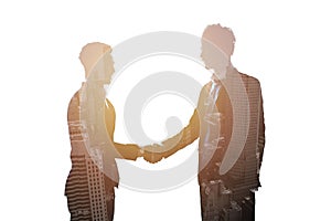 Handshake of two businessperson in office concept of partnership and teamwork.double exposure