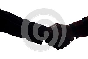 Handshake of two men, businessman and worker - horizontal silhouette