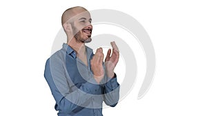 Handsom arab clapping his hands applauding on white background.