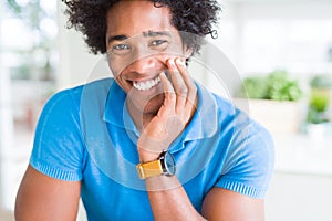 Handsome african american happy man smiling confident