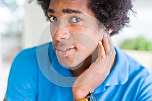 Handsome african american happy man smiling confident