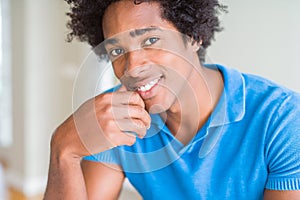 Handsome african american happy man smiling confident