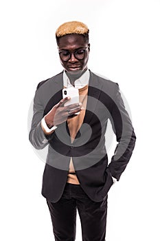 Handsome afro-american businessman sending text message isolated on white background