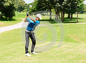 Handsome asian golfers man putt golf.