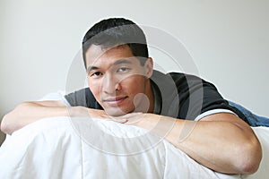 Handsome Asian Man resting