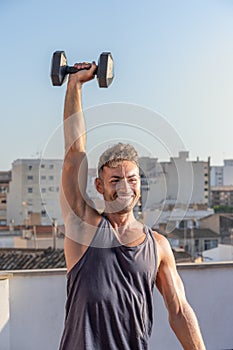 Handsome and athletic man in fitness sesion photo