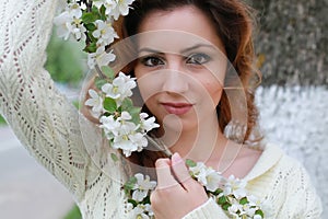 Woman smell tree flower