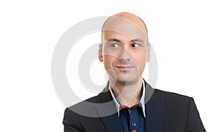 Handsome bald man looking to copy space