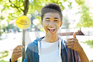 Handsome beaming student seeing sunny sides of situation