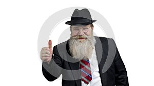 Handsome bearded businessman showing thumb up.