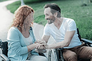 Handsome bearded male talking to his girlfriend