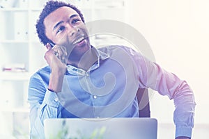 Handsome black man on phone