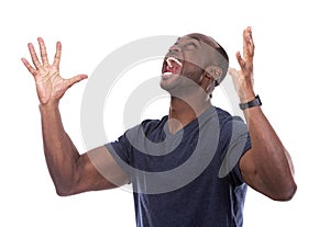 Handsome black man screaming with excitement photo