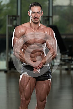 Handsome Body Builder Making Most Muscular Pose