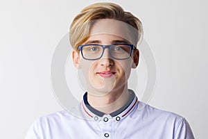 Handsome boy teenager in glasses