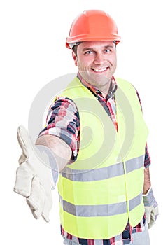 Handsome builder doing hand shake gesture