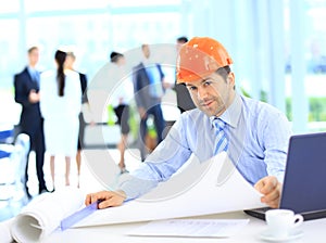 Handsome business construction man on the work site