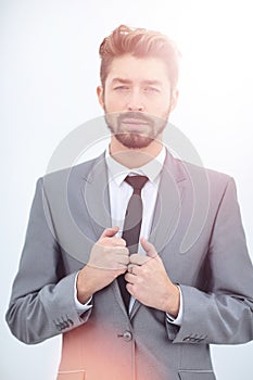 Portrait of a smiling handsome business man over white backgrou