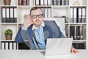 Handsome business man overhear in office