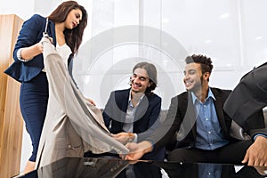 Handsome Business Man And Woman Fashion Shop, Customers Choosing Clothes In Retail Store