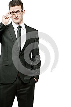 Handsome businessman in black suit on white.