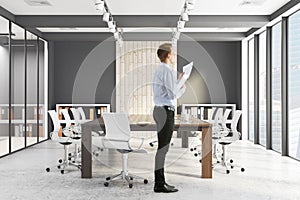 Handsome businessman in conference room