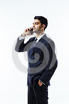 Handsome businessman entrepreneur talking on the phone