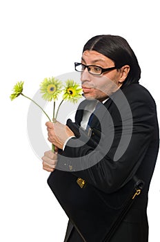 Handsome businessman with flower and brief case