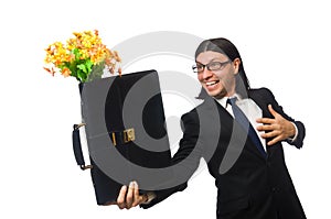 Handsome businessman with flower and brief case