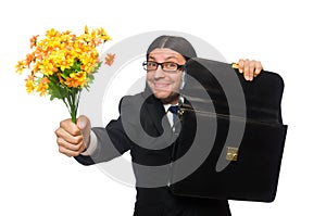 Handsome businessman with flower and brief case