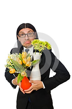 Handsome businessman with flower pot isolated on