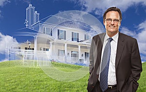 Handsome Businessman with Ghosted House Drawing Behind