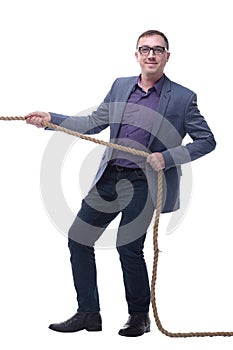 Handsome businessman in glasses pulling a rope