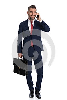 Businessman happy to close a deal over the phone