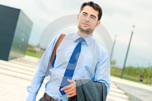 Handsome businessman or manager going home