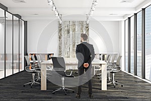 Handsome businessman in meeting room