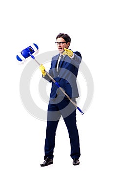 The handsome businessman with the mop isolated on white background