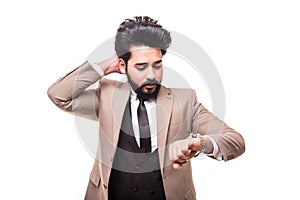 Handsome arab businessman showing time on his watch  on white background