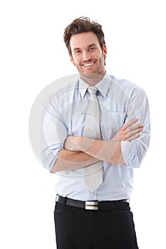 Handsome businessman smiling confidently photo