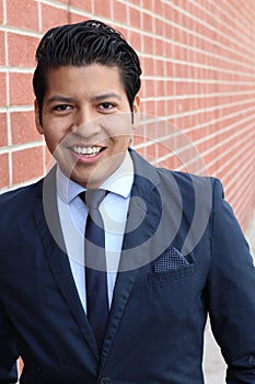 Handsome businessman smiling isolated
