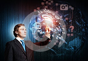 Handsome businessman using virtual interface