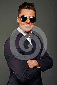 Handsome businessman in sunglasses